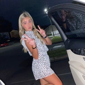 Speckled high neck romper with ruffle sleeves